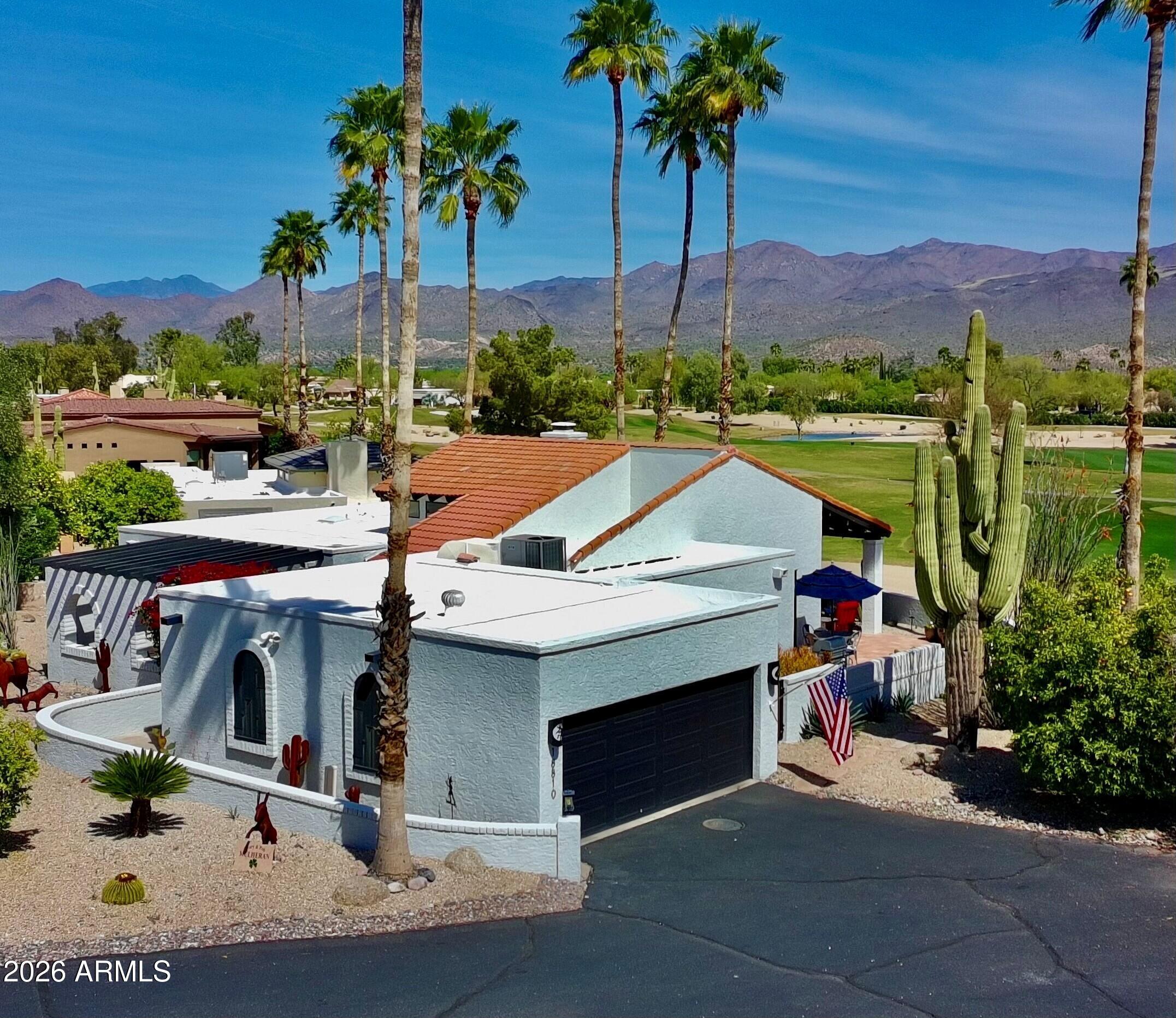 18810 East Chinle Drive Rio Verde, AZ 85263 - Photo 2 of 38 a view of houses with an outdoor space and lakeside