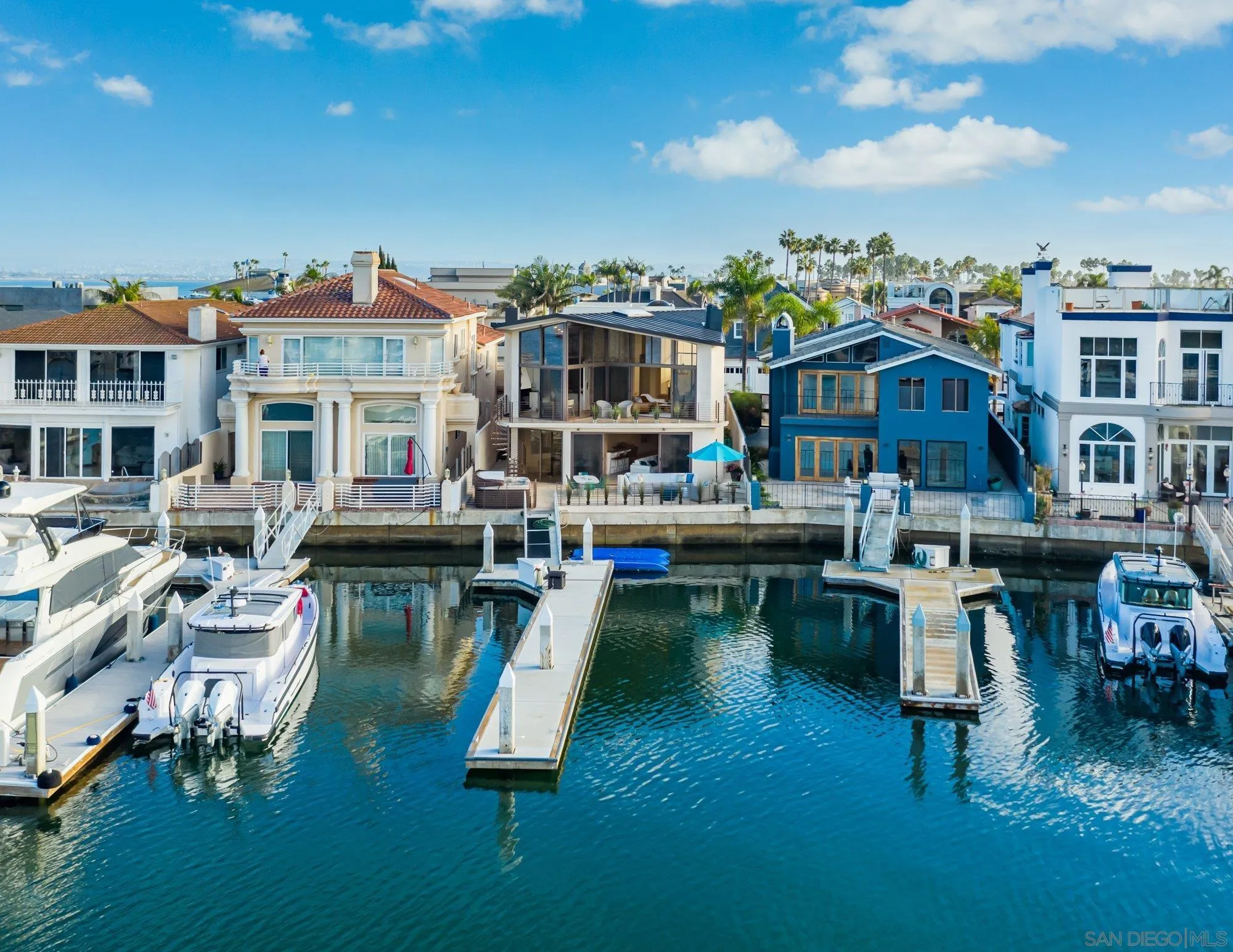 a view of a swimming pool with outdoor seating