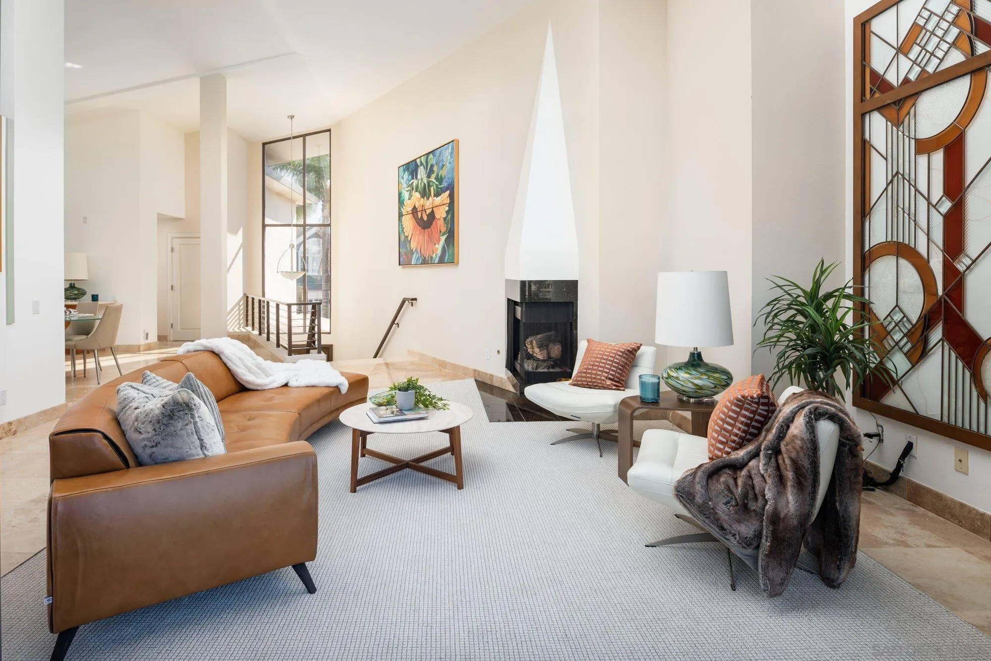 25 The Point Coronado, CA 92118 - Photo 11 of 52 a living room with furniture and a large window