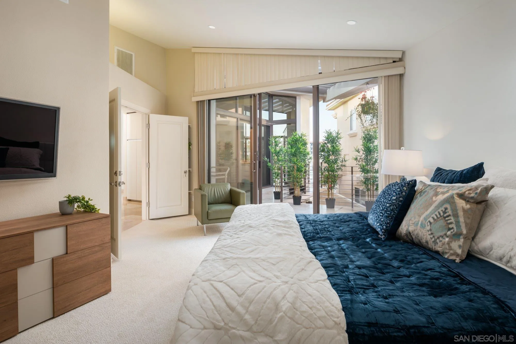 25 The Point Coronado, CA 92118 - Photo 24 of 52 a living room with furniture and a flat screen tv