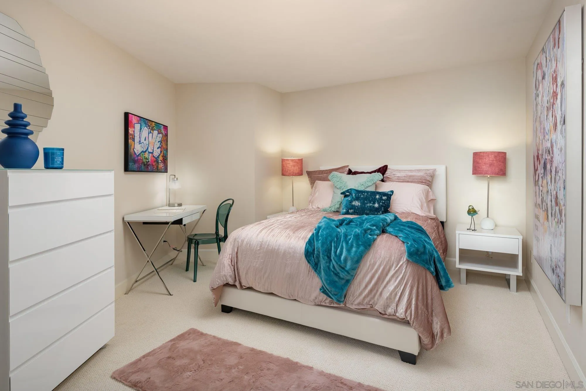 25 The Point Coronado, CA 92118 - Photo 27 of 52 a bedroom with a bed and a table