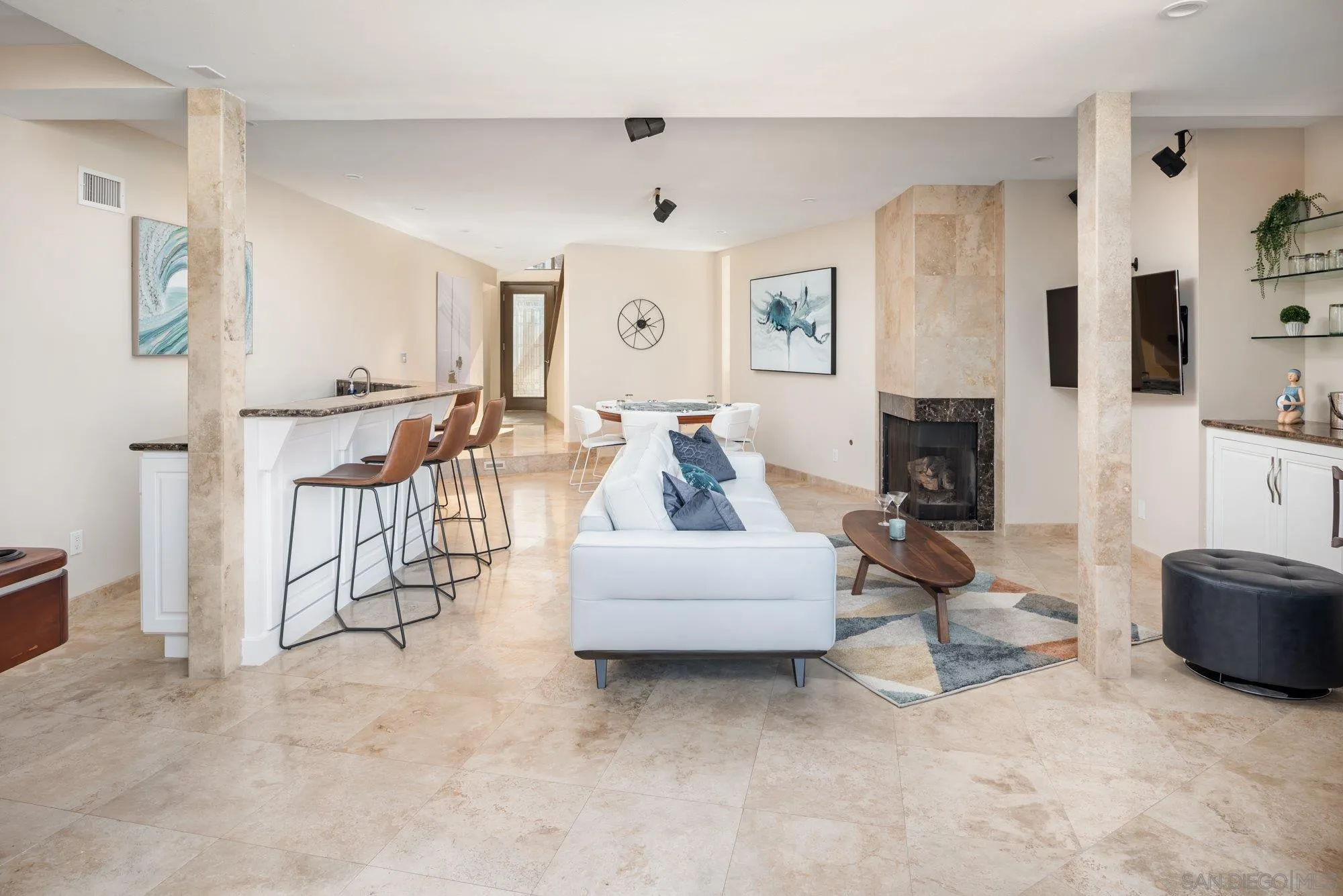 25 The Point Coronado, CA 92118 - Photo 34 of 52 a living room with furniture and a flat screen tv