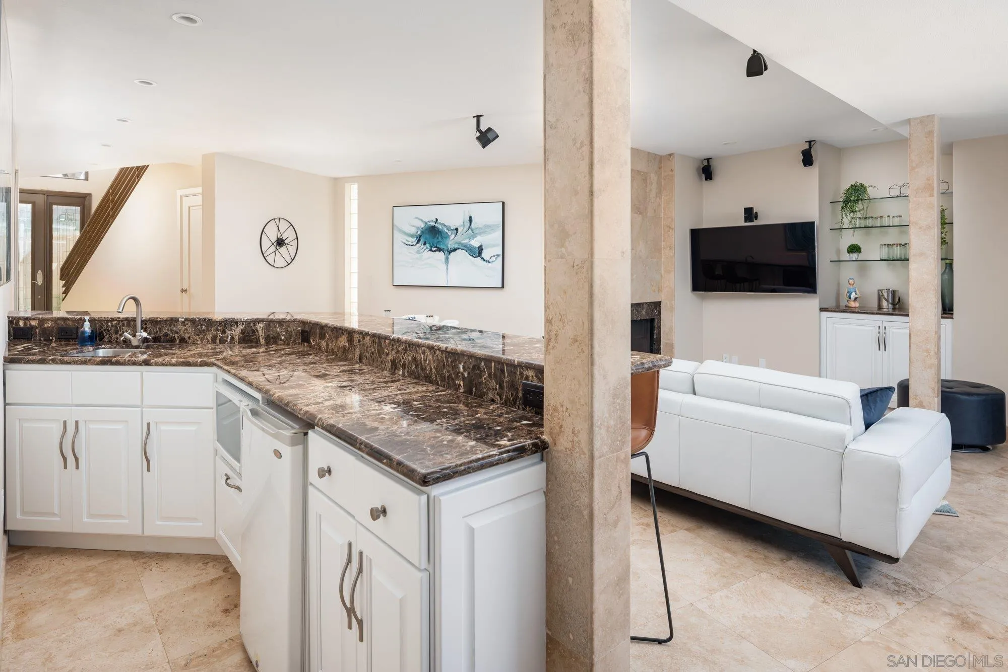 25 The Point Coronado, CA 92118 - Photo 35 of 52 a living room with furniture and a flat screen tv