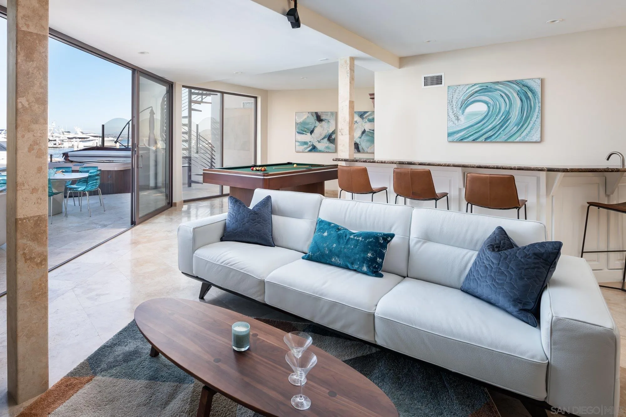 25 The Point Coronado, CA 92118 - Photo 37 of 52 a living room with furniture and a large window