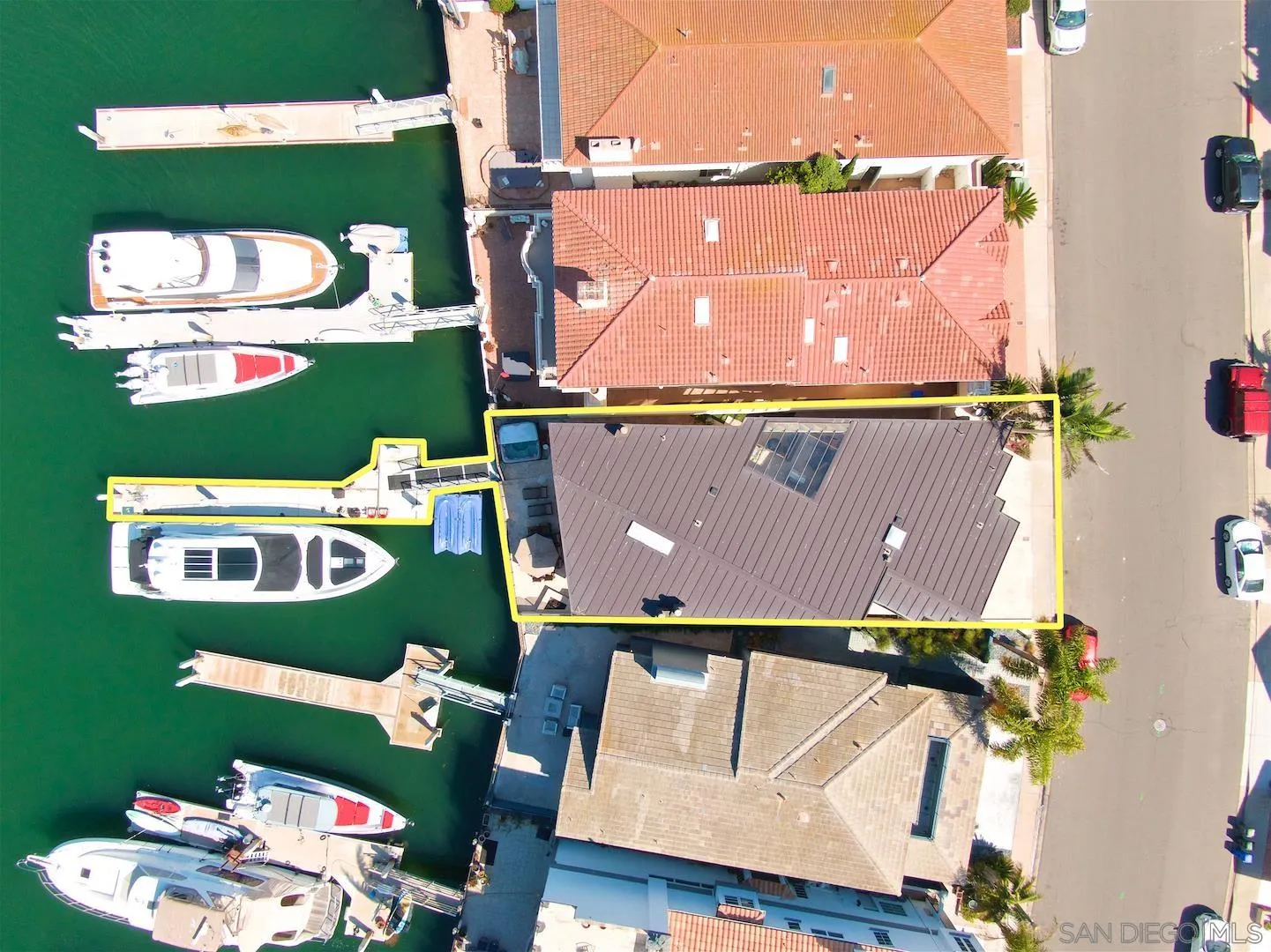 25 The Point Coronado, CA 92118 - Photo 50 of 52 an aerial view of a house with a swimming pool patio and outdoor seating