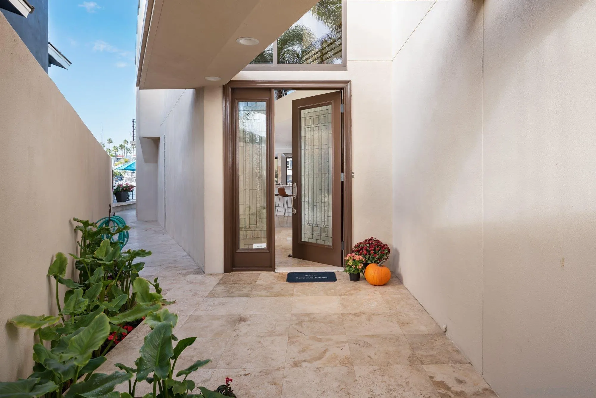 25 The Point Coronado, CA 92118 - Photo 5 of 52 a backyard of a house with seating space