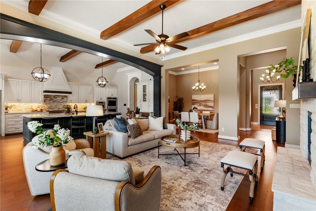 2833 Persimmon Ridge Court Bryan, TX 77807 - Photo 26 of 50 a living room with furniture and a chandelier