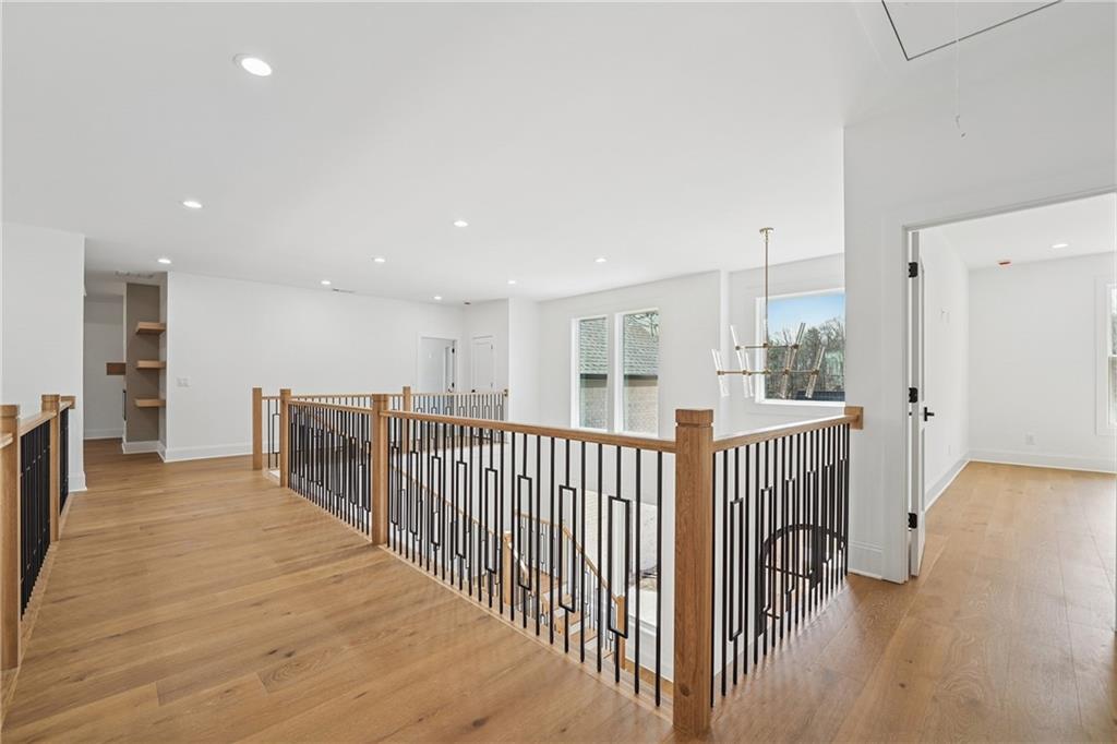 3315 Bold Springs Road Dacula, GA 30019 - Photo 22 of 63 a view of a hallway with wooden floor and windows