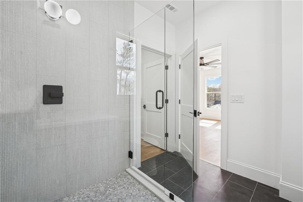 3315 Bold Springs Road Dacula, GA 30019 - Photo 34 of 63 a view of a bathroom with shower