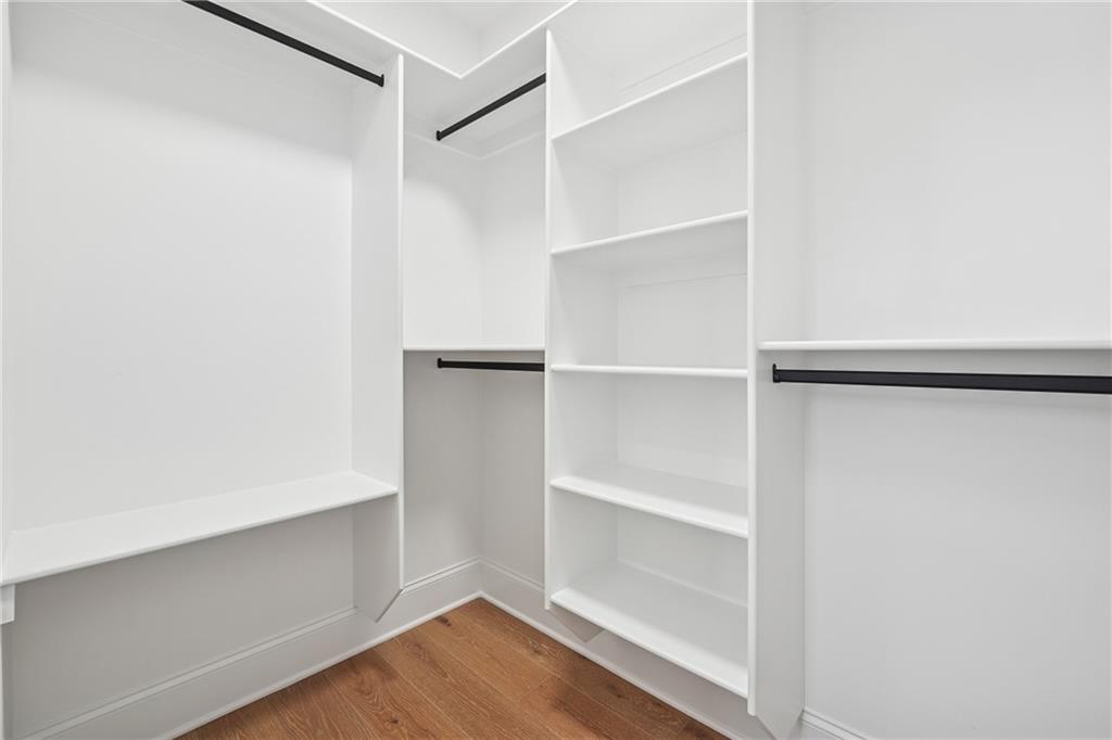 3315 Bold Springs Road Dacula, GA 30019 - Photo 35 of 63 a view of walk in closet with empty racks