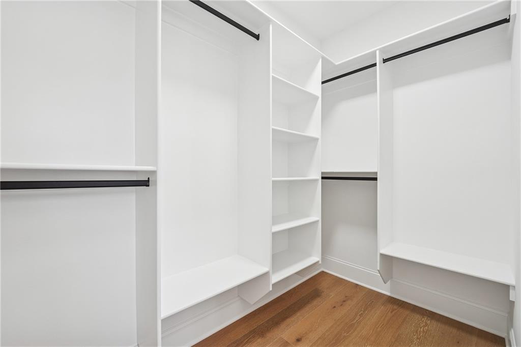 3315 Bold Springs Road Dacula, GA 30019 - Photo 39 of 63 a view of walk in closet with empty racks