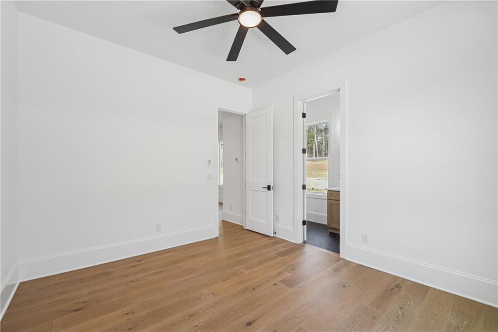 3315 Bold Springs Road Dacula, GA 30019 - Photo 57 of 63 a view of empty room with wooden floor