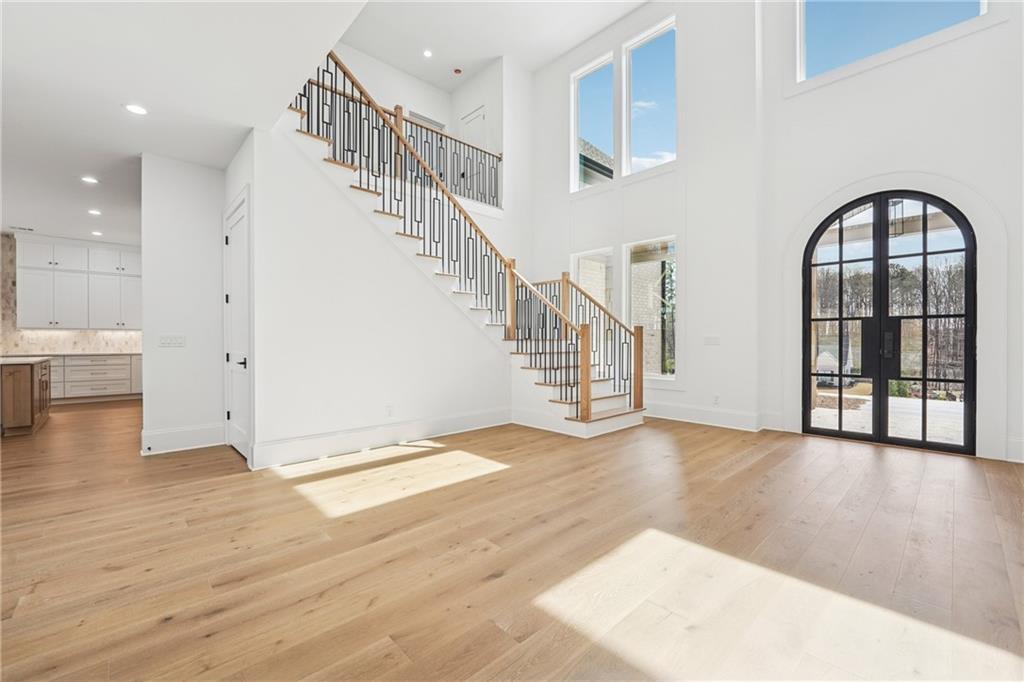 3315 Bold Springs Road Dacula, GA 30019 - Photo 6 of 63 a view of entryway and hall with wooden floor