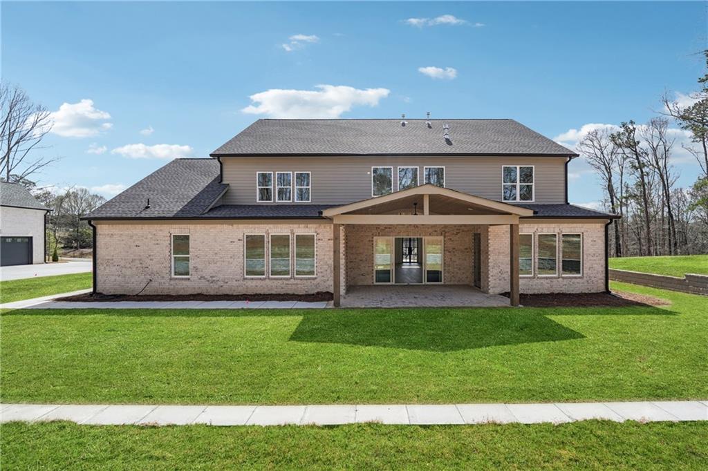 3315 Bold Springs Road Dacula, GA 30019 - Photo 62 of 63 a front view of a house with a garden