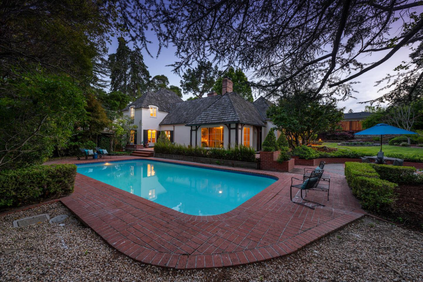 a view of a swimming pool with a patio