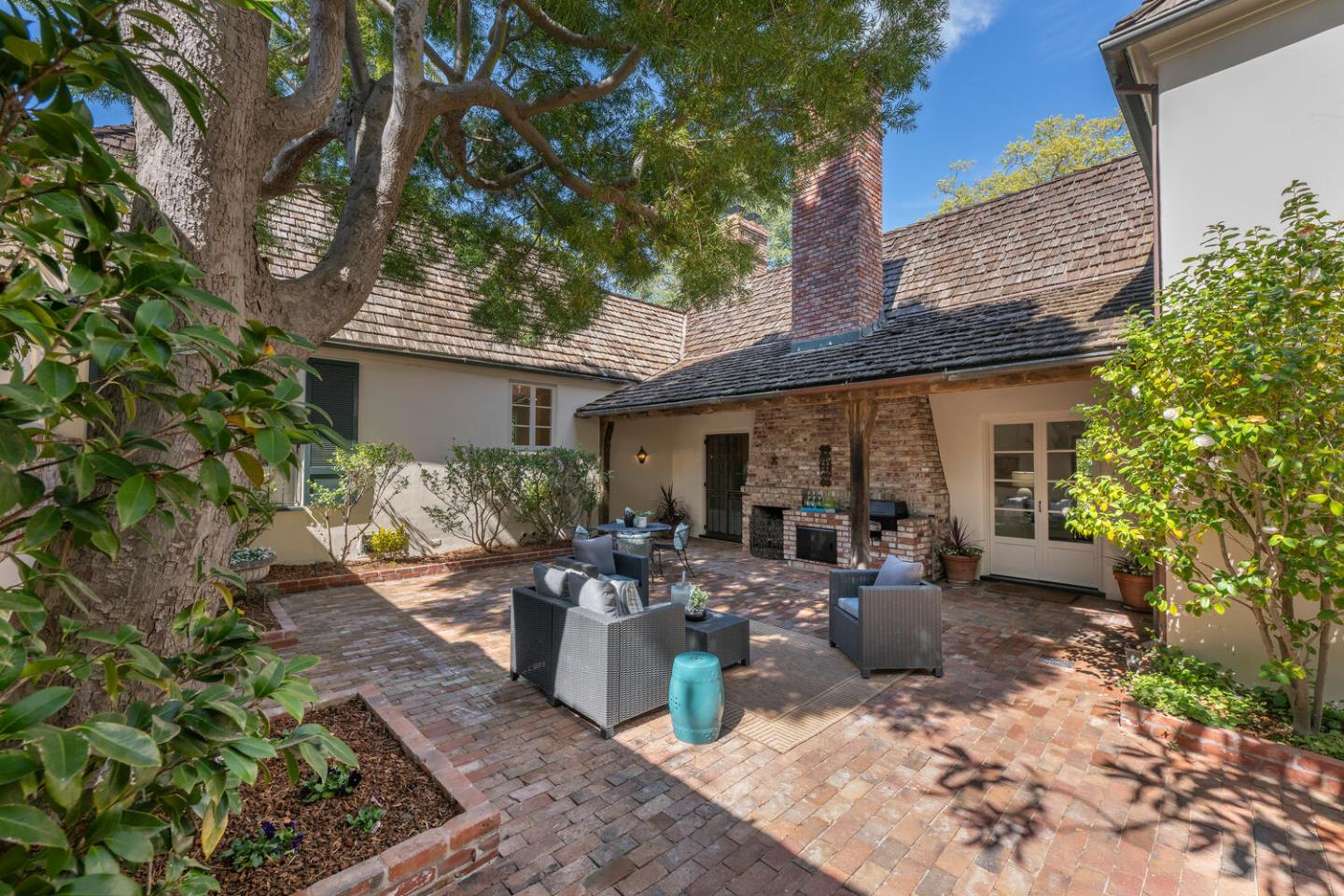 841 Hayne Road Hillsborough, CA 94010 - Photo 13 of 78 a view of a house with backyard sitting area and porch