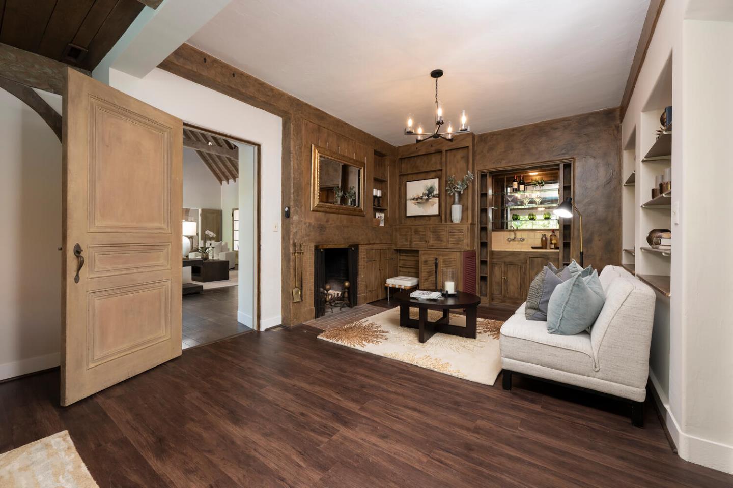 841 Hayne Road Hillsborough, CA 94010 - Photo 24 of 78 a living room with furniture and a fireplace