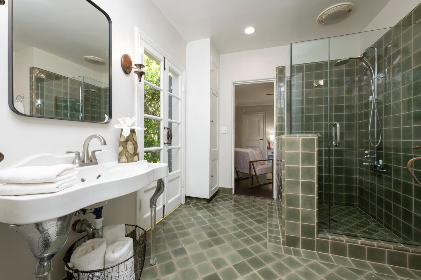 841 Hayne Road Hillsborough, CA 94010 - Photo 38 of 78 a bathroom with a double vanity sink mirror and shower