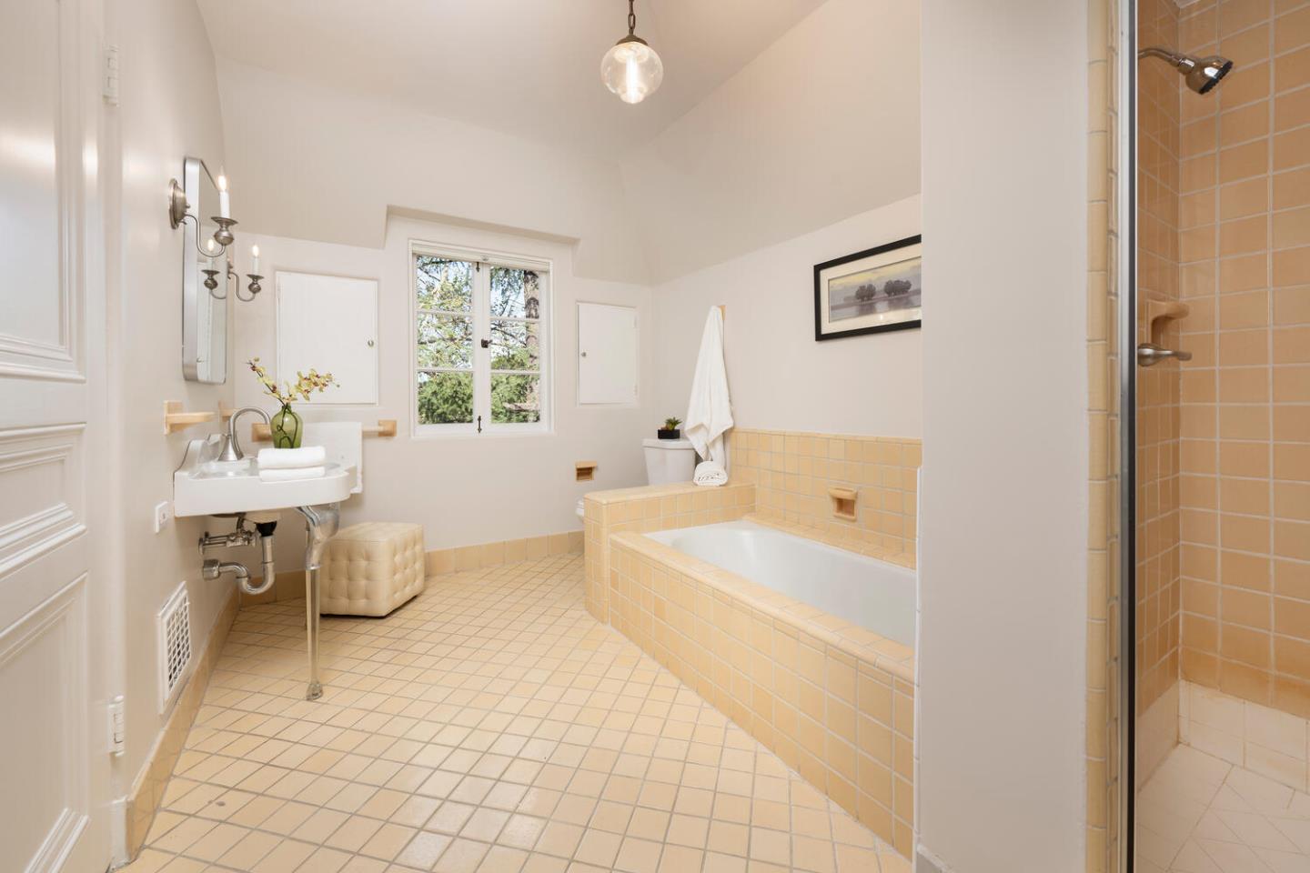 841 Hayne Road Hillsborough, CA 94010 - Photo 47 of 78 a spacious bathroom with a bathtub sink and toilet