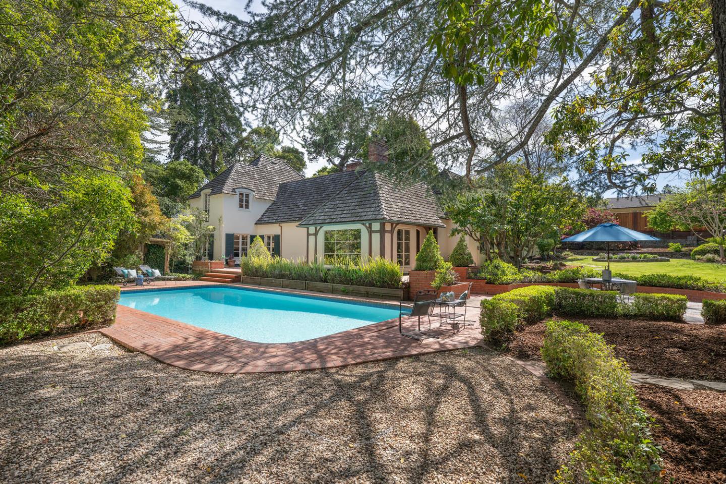 841 Hayne Road Hillsborough, CA 94010 - Photo 55 of 78 a view of a house with swimming pool and sitting area