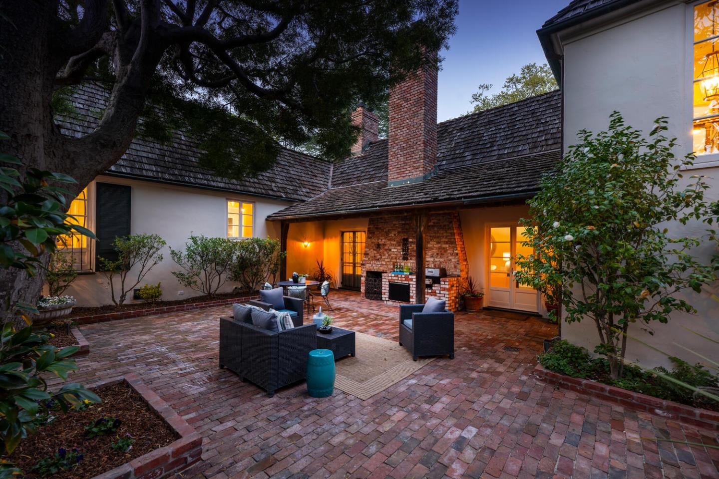 841 Hayne Road Hillsborough, CA 94010 - Photo 68 of 78 a view of a patio with table and chairs potted plants and large tree