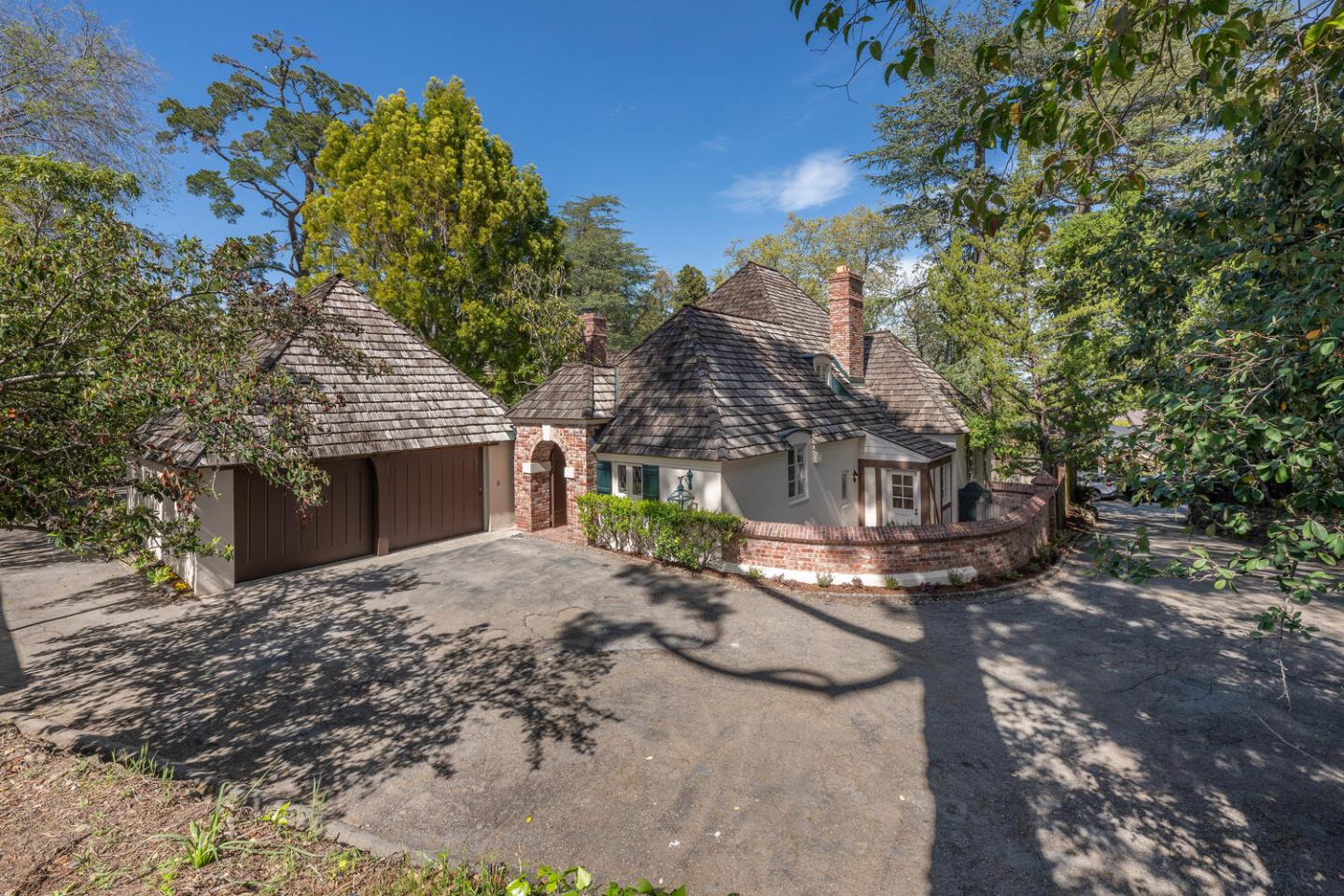 841 Hayne Road Hillsborough, CA 94010 - Photo 8 of 78 a view of a house with a tree in the background