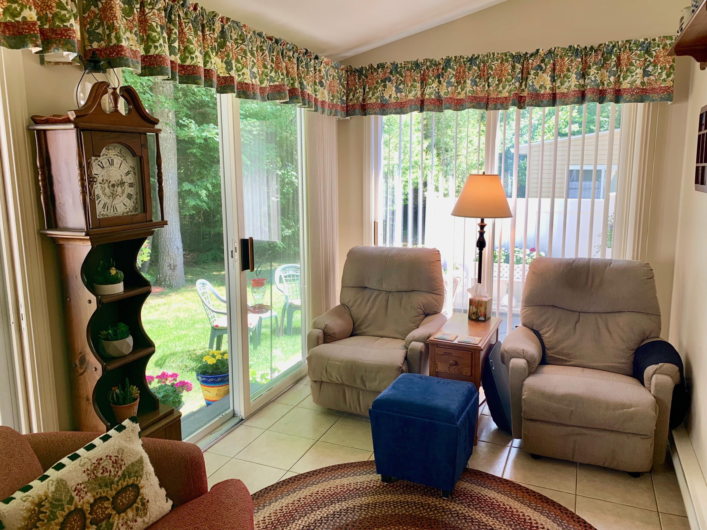 226 Flintlock Village Road, Unit 3 Wells, ME 04090 - Photo 10 of 27 Screened In Porch