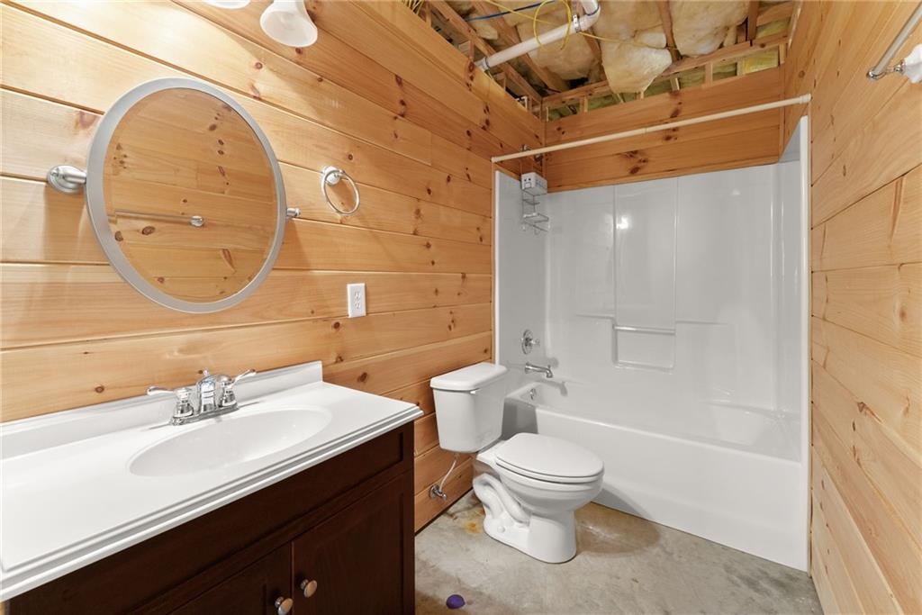 3454 Highway 254 Cleveland, GA 30528 - Photo 27 of 52 a bathroom with a sink a toilet and shower