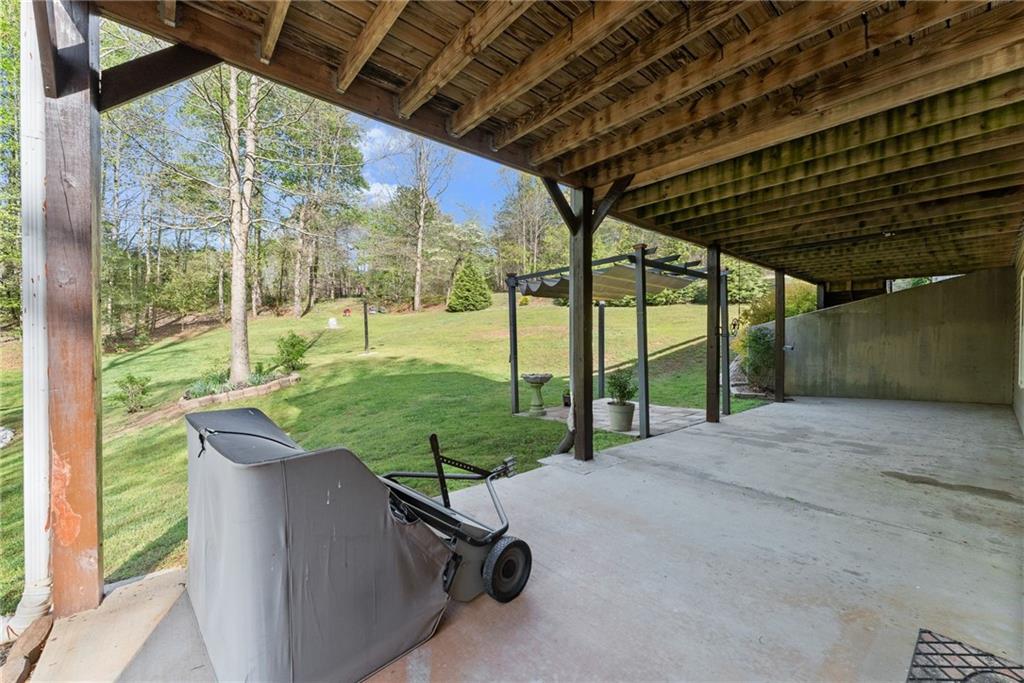 3454 Highway 254 Cleveland, GA 30528 - Photo 35 of 52 a view of a porch with furniture and a yard