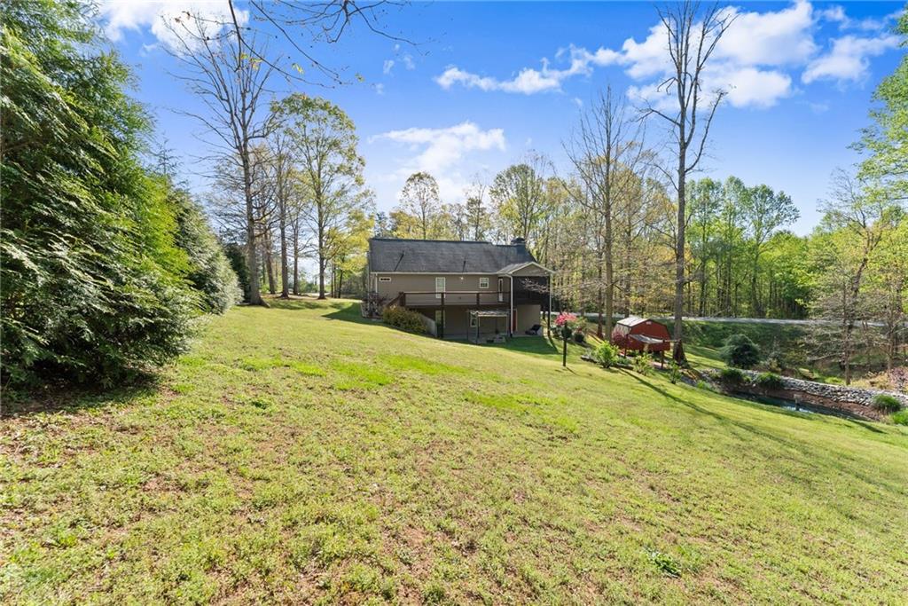 3454 Highway 254 Cleveland, GA 30528 - Photo 39 of 52 a view of a house with a big yard