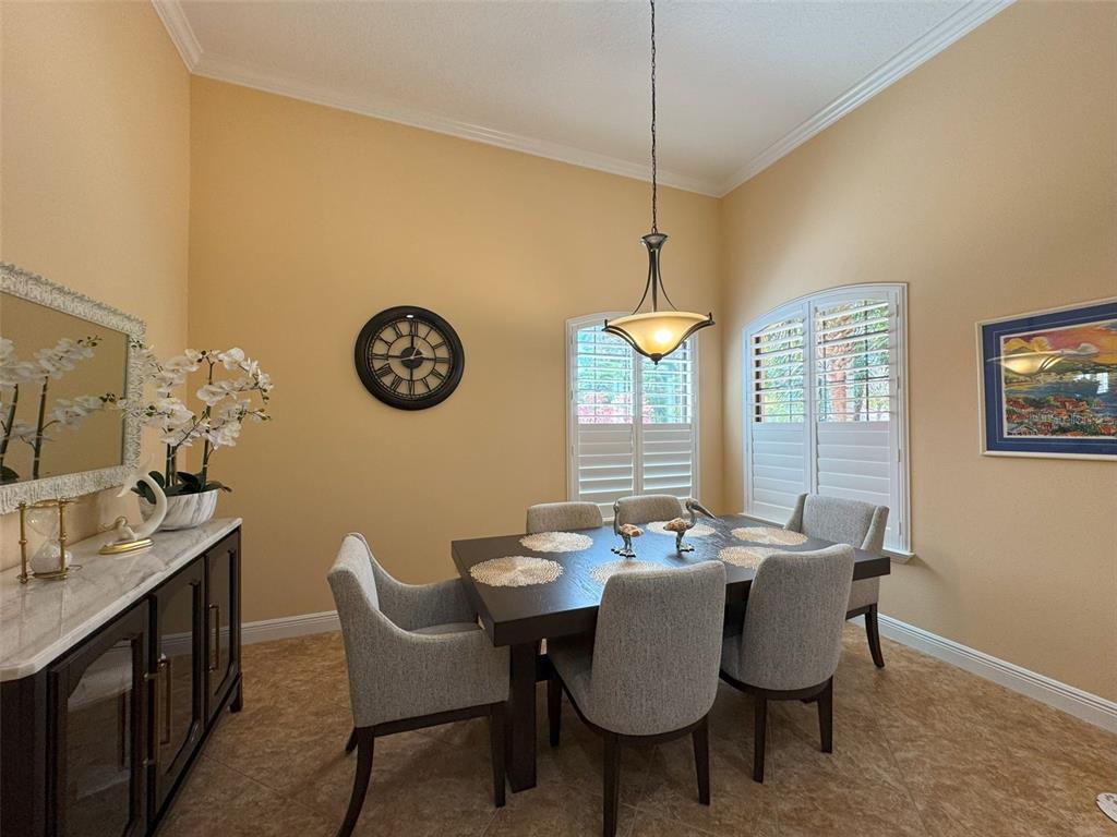 1024 West Beagle Run Loop Hernando, FL 34442 - Photo 19 of 44 a view of a dining room with furniture window and wooden floor