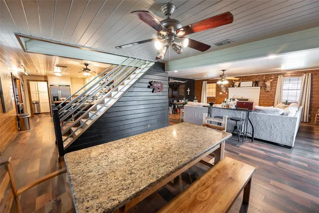 a view of a living room and dining room