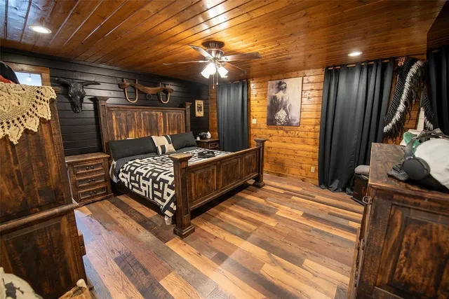 a bedroom with furniture and a walk in closet