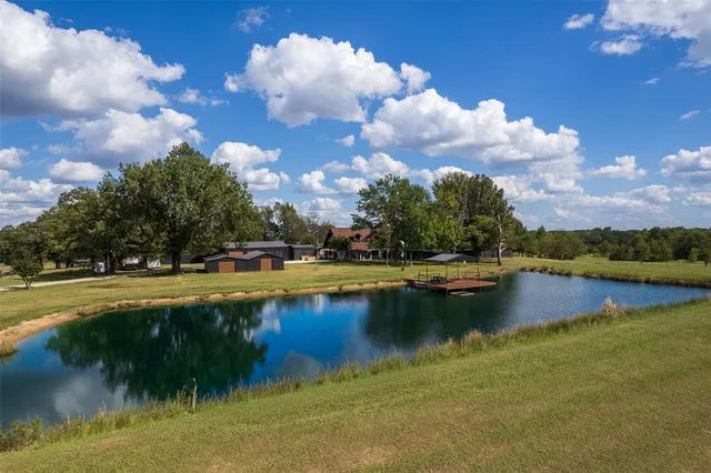 a view of swimming pool and lake