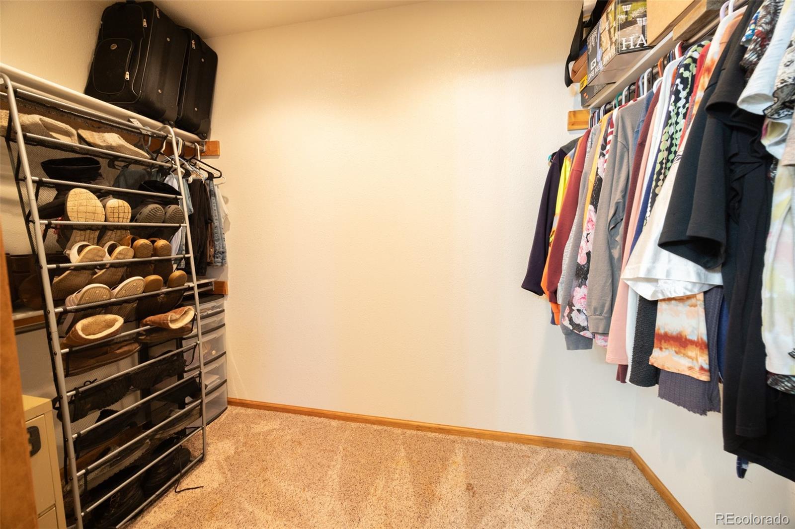 493 Caesar Road Black Hawk, CO 80422 - Photo 17 of 35 a view of walk in closet with clothes and shoes