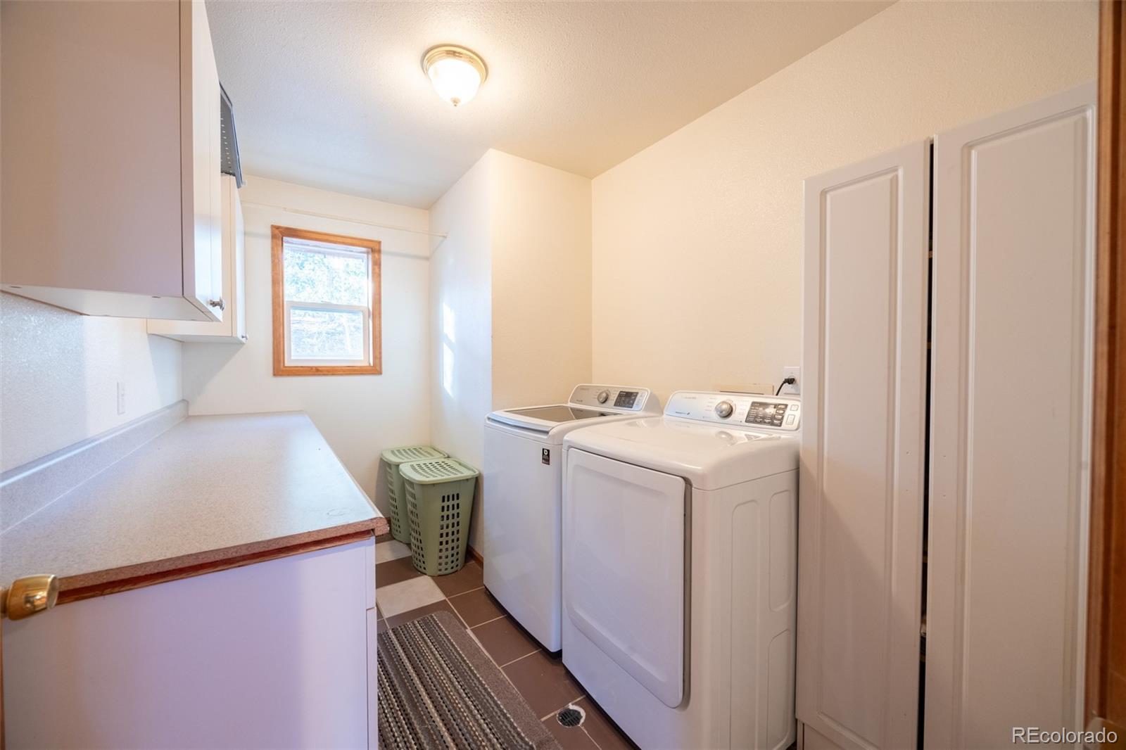 493 Caesar Road Black Hawk, CO 80422 - Photo 18 of 35 a utility room with dryer and washer