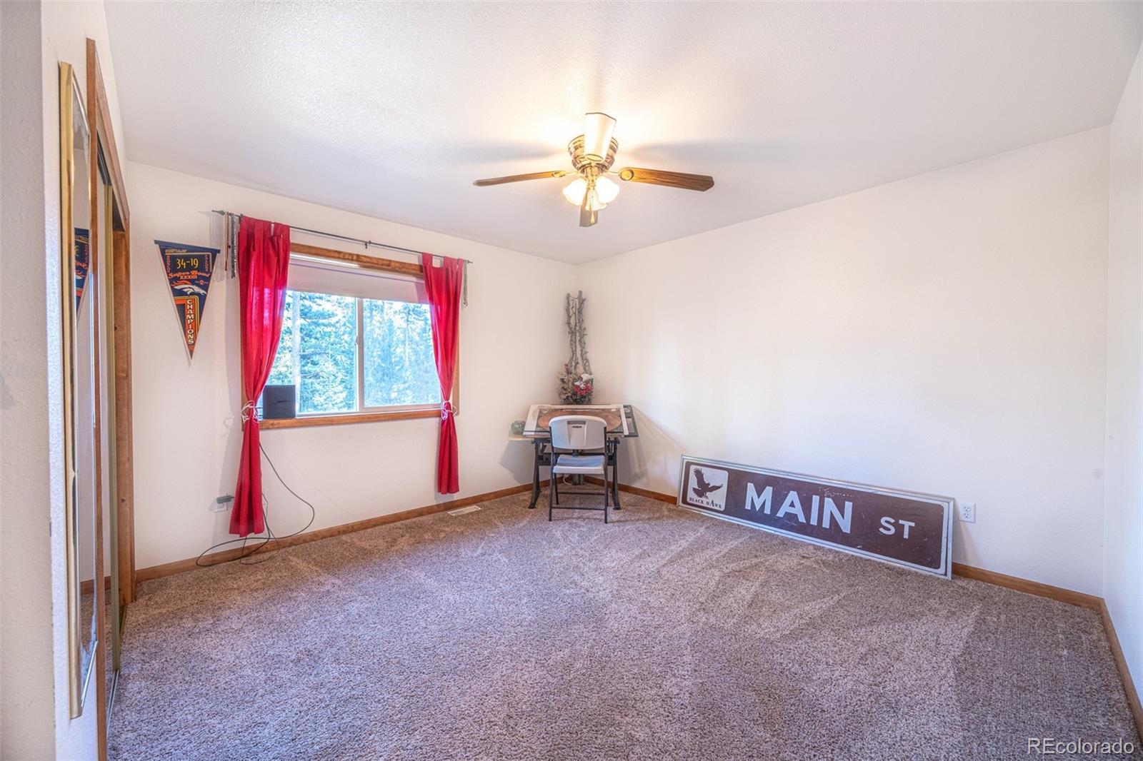 493 Caesar Road Black Hawk, CO 80422 - Photo 24 of 35 a view of livingroom with window