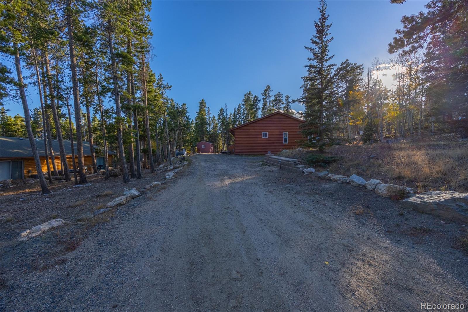493 Caesar Road Black Hawk, CO 80422 - Photo 30 of 35 a big yard with lots of green space and trees