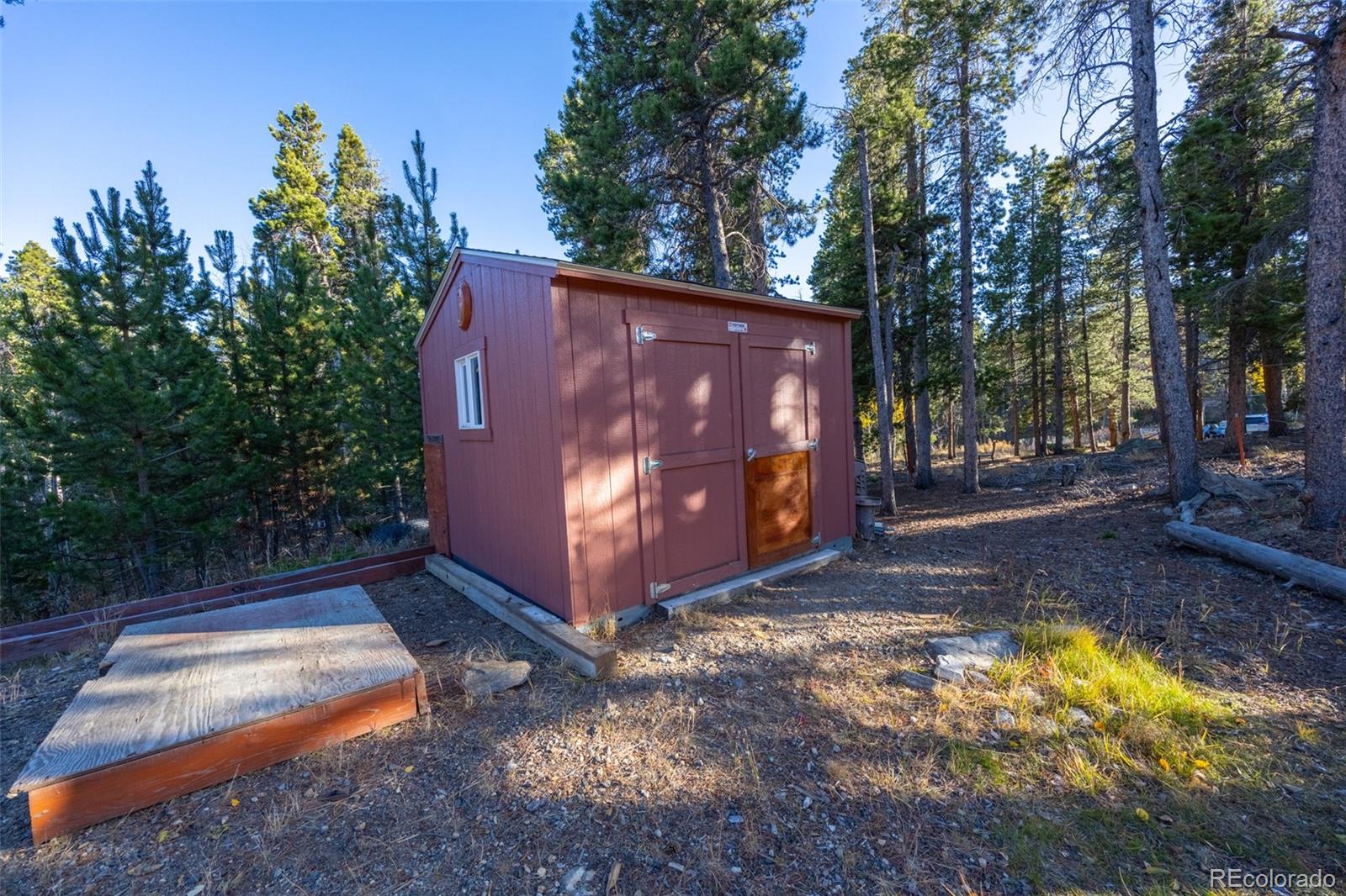 493 Caesar Road Black Hawk, CO 80422 - Photo 31 of 35 a view of backyard with tree