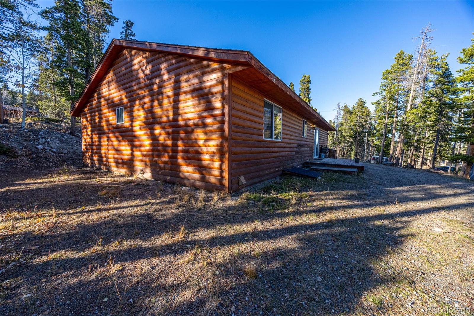493 Caesar Road Black Hawk, CO 80422 - Photo 32 of 35 a front view of house with yard