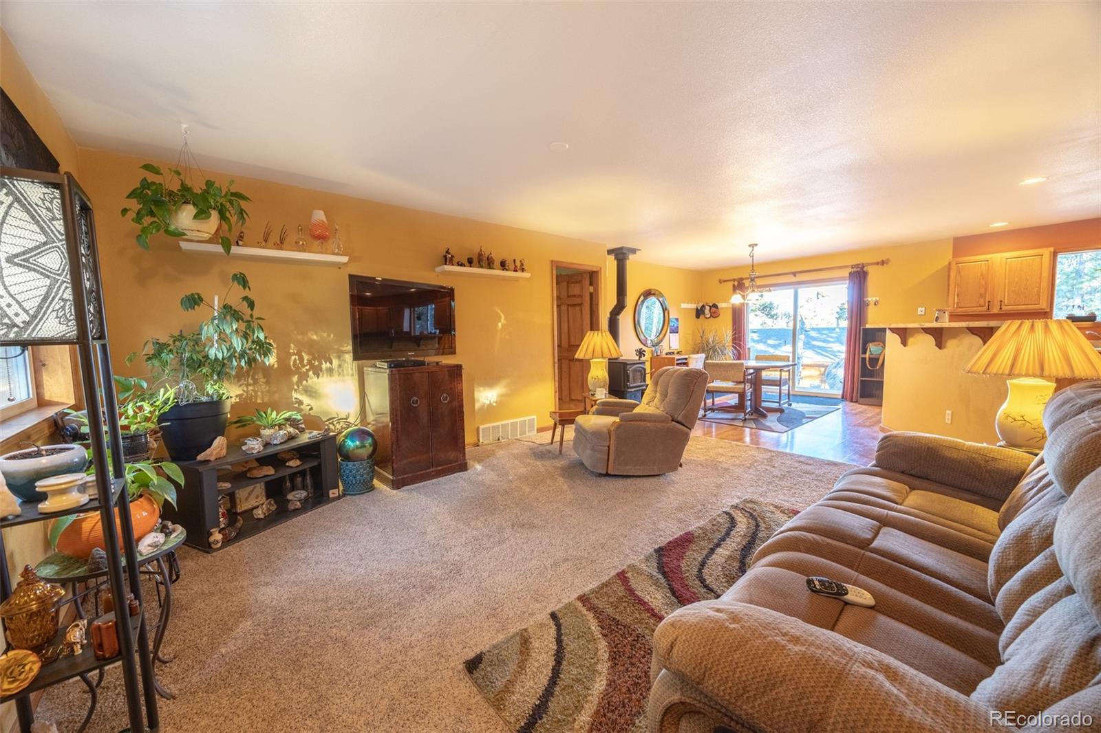 493 Caesar Road Black Hawk, CO 80422 - Photo 8 of 35 a living room with furniture and a large window