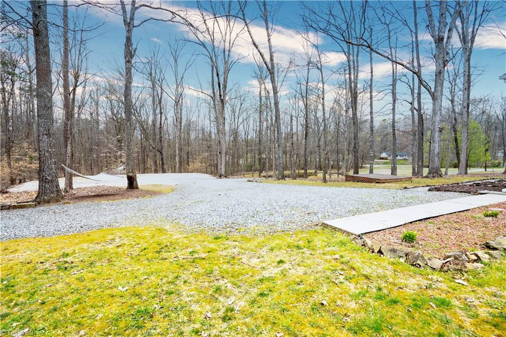 5200 Folgers Mill Road Julian, NC 27283 - Photo 19 of 20 Graded and graveled area, lower past hammock