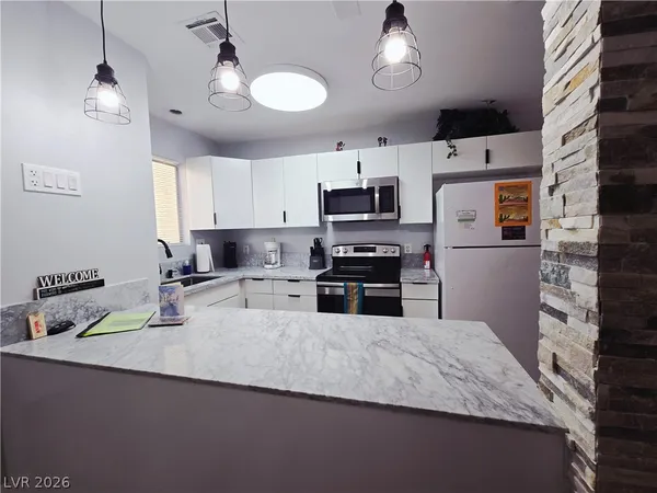 $1,910 | 5045 Spencer Street, Unit B, Las Vegas, NV 89119