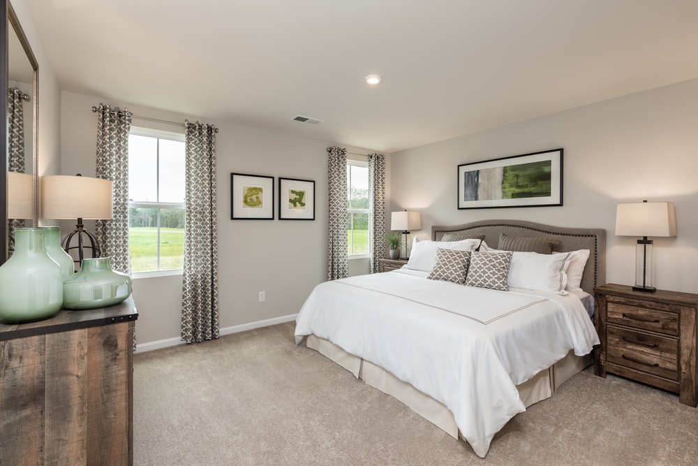 630 Wingtip Way Harrisonburg, VA 22801 - Photo 9 of 15 a bedroom with a bed and wooden floor