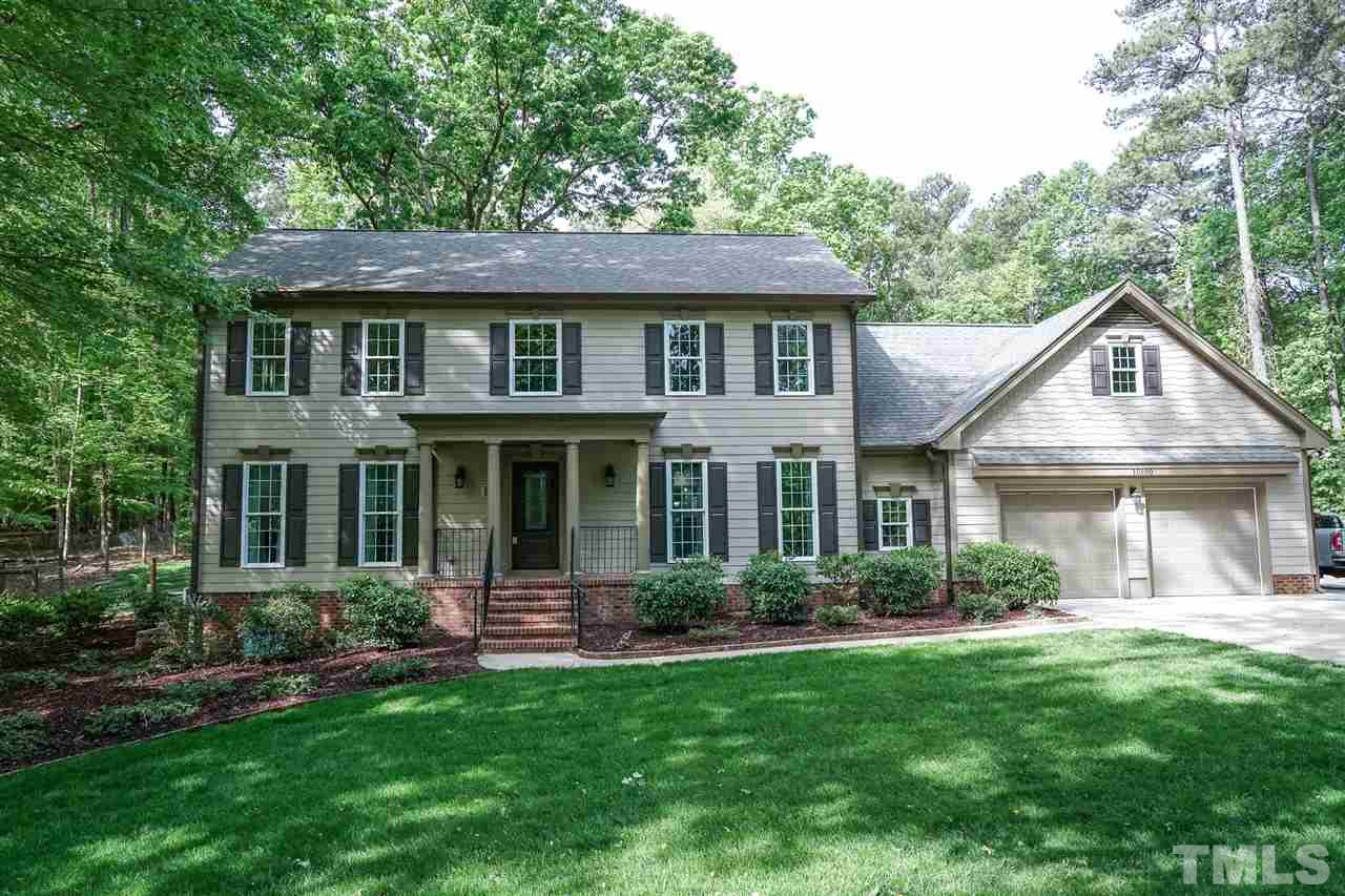 10100 Touchwood Place Raleigh, NC 27613 - Photo 1 of 26 New Hardy Plank siding, Lush manicured lawn.