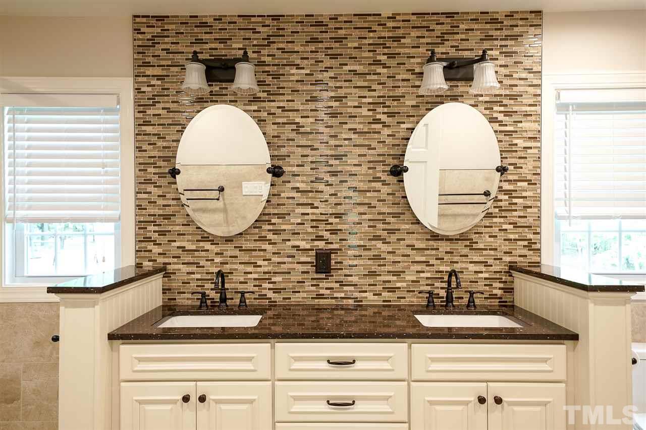 10100 Touchwood Place Raleigh, NC 27613 - Photo 15 of 26 Dual vanities