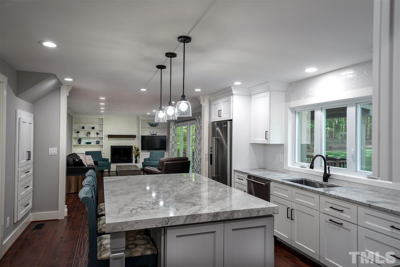 10100 Touchwood Place Raleigh, NC 27613 - Photo 7 of 26 Natural Stone Counter tops.