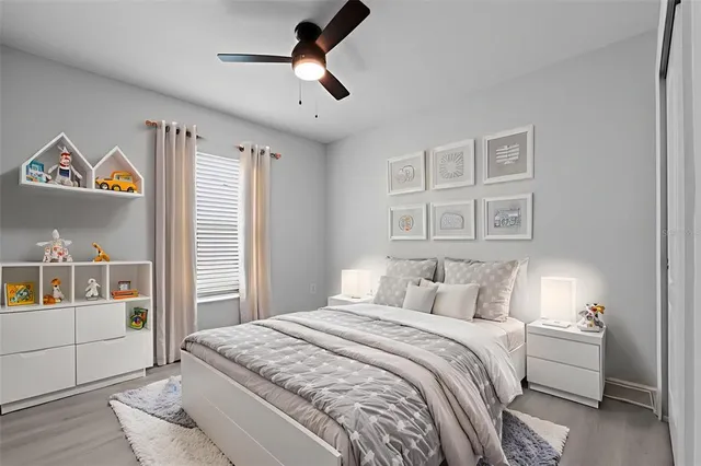 a kitchen with stainless steel appliances granite countertop a sink a stove a refrigerator a washer and dryer