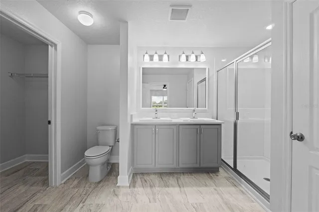 view of a pool with a patio