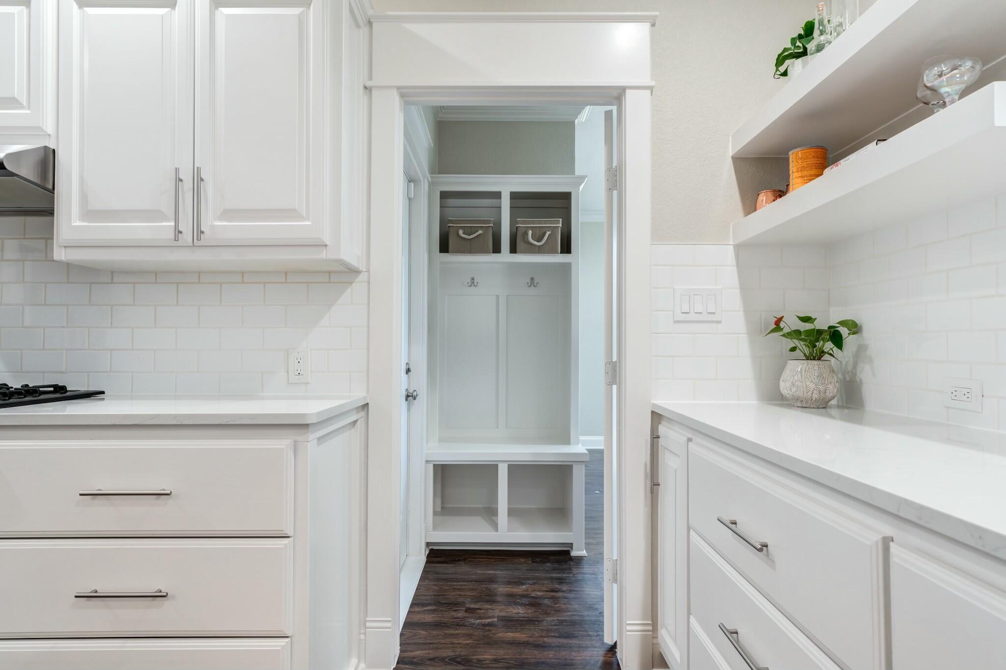 3219 22nd Street Lubbock, TX 79410 - Photo 17 of 51 a bathroom with a sink and a mirror